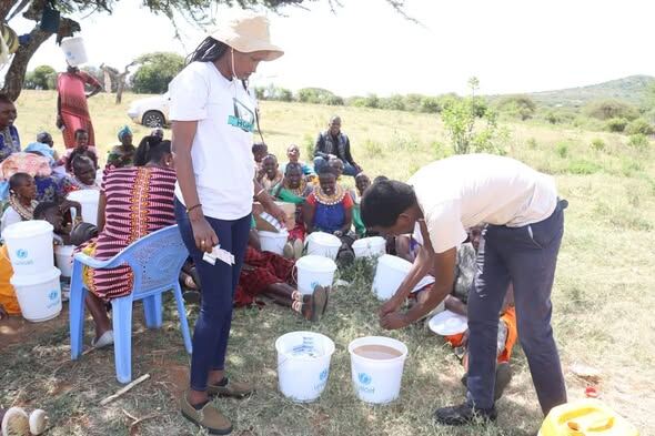 Women's groups receiving farm tools and seedlings in Leir Baawa, October 2024